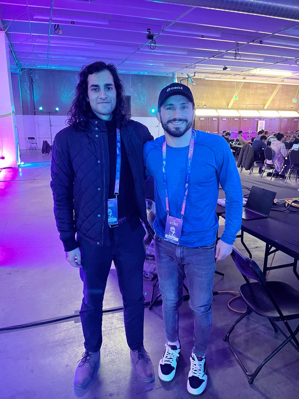 Malik Amine at a tech hackathon event, connecting with startup founders